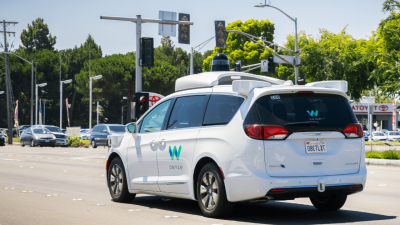A self driving car going down a road