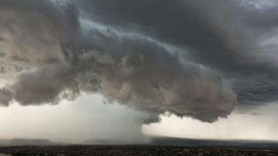 A photograph of storm clouds and rain.