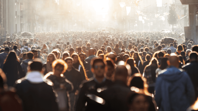 A generic photo of a crowded street in a city.