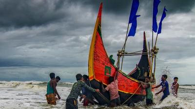 A group of Bangladeshi fishermen out at sea.