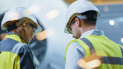 Construction workers in conversation
