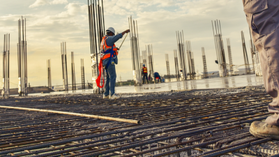 Workers observing a construction site