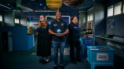 A team photo from a National Space Academy classroom.