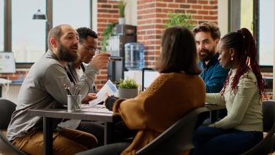 A team of people brainstorming at work.