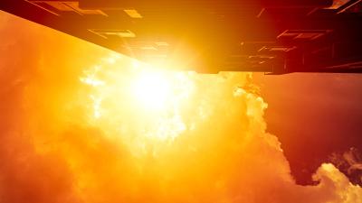 Shot facing sky showing blazing sun