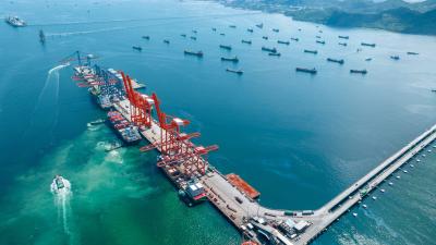 Container ship under the crane Sea Port service logistics and transportation