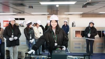 People in the technical area of a shipyard