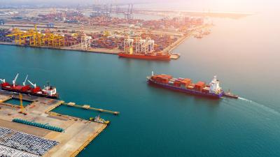 Aerial view of container cargo ship in sea.