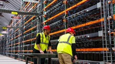 Engineers in AI data centre