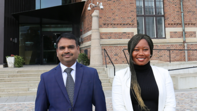 World Maritime University fellows - Mithilesh Kumar and Faith Maraga stood next to eachother