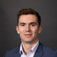 A profile photograph of Matthew Munn