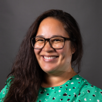 A profile photograph of Melanie Collins.
